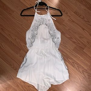 White romper with floral detail